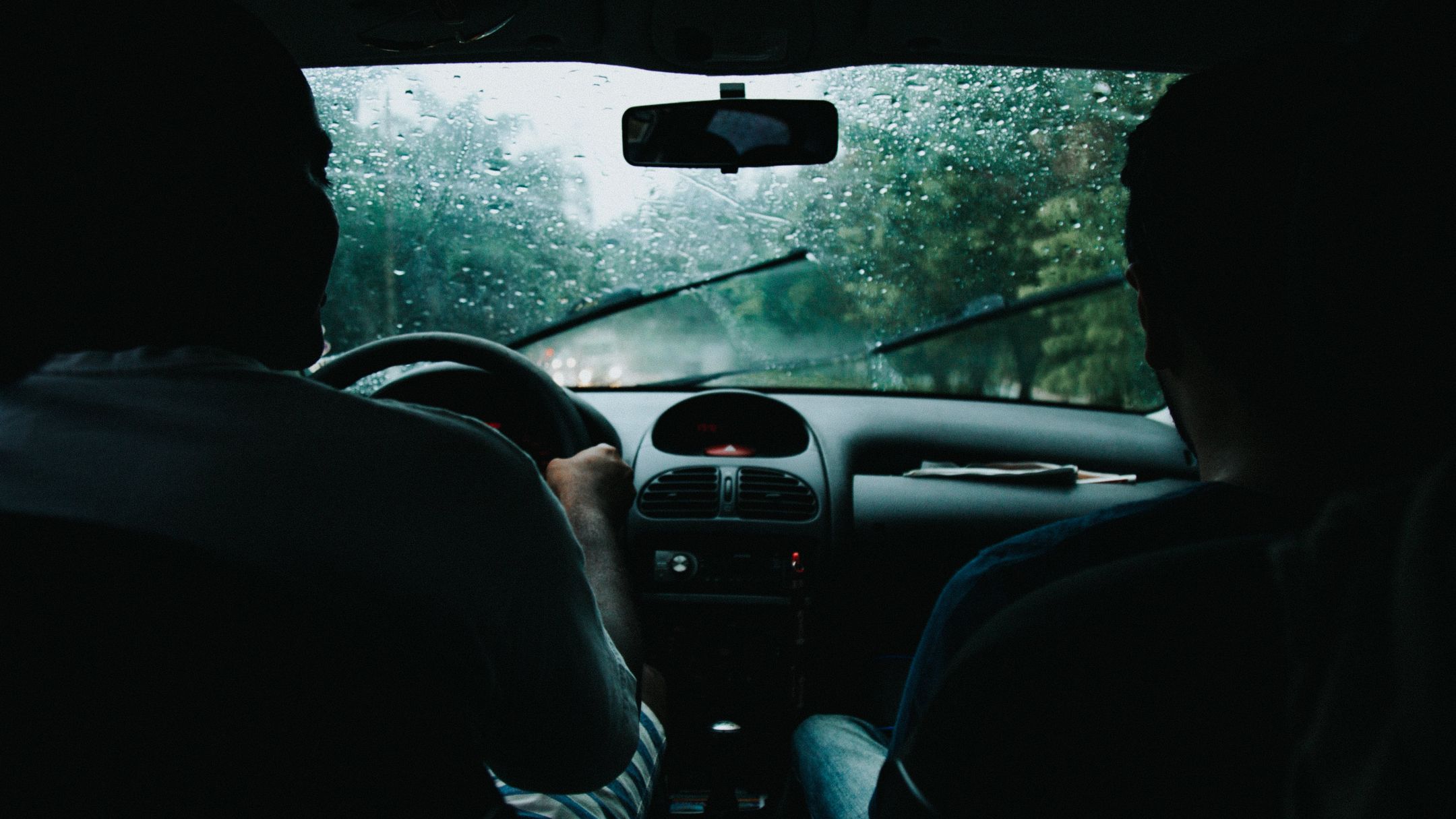 Two Men Inside Moving Vehicle