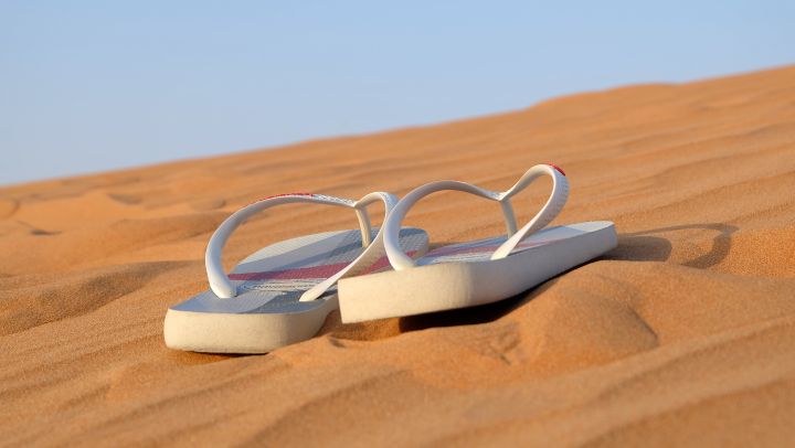 Pair of White Flip-flops on Focus Photo