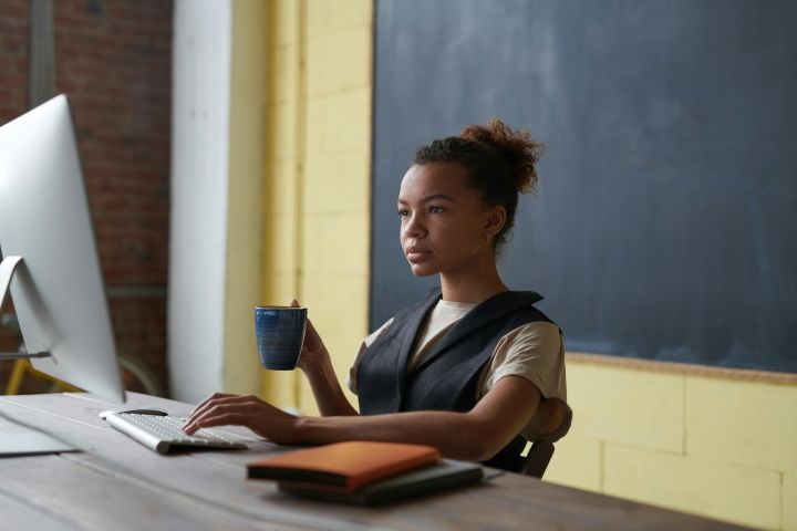 Photo Of Woman Holding Mug